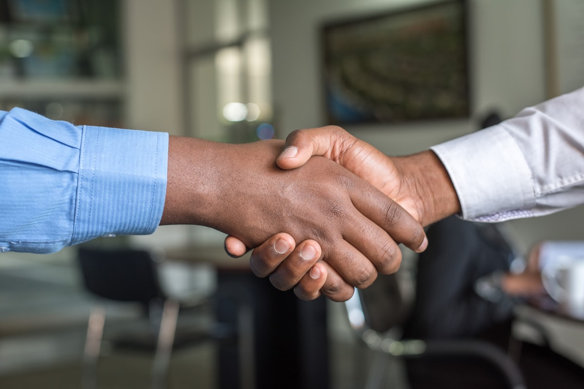 Private equity partnership handshake